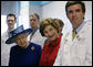 Mrs. Laura Bush and Her Majesty Queen Elizabeth II of Great Britain meet with staff members Tuesday, May 8, 2007, during a visit to the Children’s National Medical Center in Washington, D.C. White House photo by Shealah Craighead