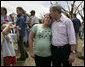 President George W. Bush comforts a survivor of Friday's deadly tornado during his visit Wednesday, May 9, 2007, to Greensburg, Kansas. The tornado, spanning more than 1.5 miles, destroyed more than 90 percent of the town, leaving 11 dead in its wake. White House photo by Eric Draper