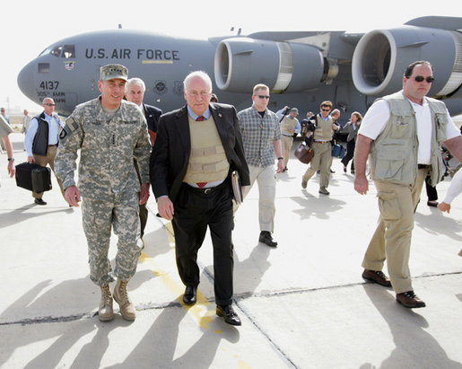 Vice President Dick Cheney walks with General David Petraeus, Commander of U.S. forces in Iraq, upon arrival to Baghdad Wednesday, May 9, 2007. The Vice President began a trip to the Middle East with an unannounced visit to Iraq to meet with Iraqi officials and U.S. leadership. White House photo by David Bohrer