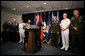 President George W. Bush responds to a reporter’s question following his meeting with Secretary of Defense Robert Gates and members of the Joint Chiefs of Staff Thursday, May 10, 2007, at the Pentagon in Arlington,Va. From left are: U.S. Army Chief of Staff Gen. George Casey; Air Force Chief of Staff Gen. Michael Moseley; Joint Chiefs Vice Chairman Navy Adm. Edmund Giambastiani; U.S. Defense Secretary Robert Gates; Joint Chiefs Chairman Gen. Peter Pace; Chief of Naval Operations Adm. Michael Mullen and Marine Corps Commandant Gen. James Conway. White House photo by Eric Draper