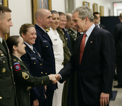 President George W. Bush greets military personnel on his visit to the Pentagon Thursday, May 10, 2007 in Arlington, Va., for a meeting with U.S. Defense Secretary Robert Gates and members of the Joint Chiefs of Staff. White House photo by Eric Draper