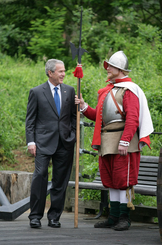 President George W. Bush stands with an actor in period garb Sunday during a tour of the Jamestown Settlement, in Jamestown, Va. The President and Mrs. Bush joined the celebration honoring the 400th anniversary of the settlement, receiving lessons in sail making and visiting the archaeological dig. White House photo by Eric Draper