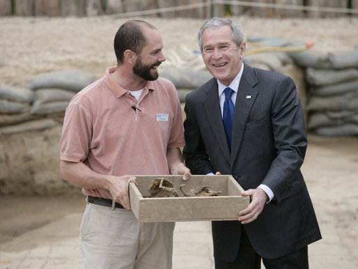 President George W. Bush shares a moment with Michael Lavin, senior conservator at the historic Jamestowne site Sunday, May 13, 2007, during a visit by the President and Mrs. Laura Bush in celebration of the settlement's 400th anniversary. The President urged all to come and see "the fantastic history that's on display." He added, "I think you'll be amazed at how our country got started." White House photo by Shealah Craighead