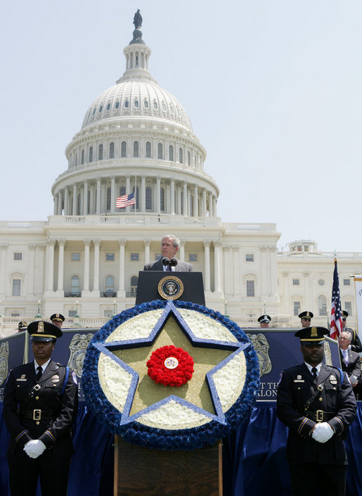 President George W. Bush addresses his remarks at the annual Peace Officers' Memorial Service outside the U.S. Capitol Tuesday, May 15, 2007, paying tribute to law enforcement officers who were killed in the line of duty during the previous year and their families. White House photo by Joyce Boghosian