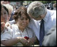 President George W. Bush comforts a family member of a fallen law enforcement officer at the annual Peace Officers' Memorial Service at the U.S. Capitol Tuesday, May 15, 2007. White House photo by Joyce Boghosian