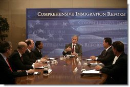 President George W. Bush participates in a roundtable discussion on comprehensive immigration reform and employment eligibility verification Wednesday, May 16, 2007, at the Embassy Suites Washington, D.C.-Convention Center.  White House photo by Joyce Boghosian