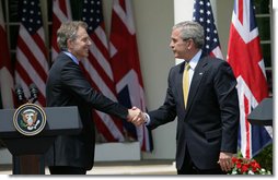 President George W. Bush and Prime Minister Tony Blair shake hands following their joint press availability Thursday, May 17, 2007, in the Rose Garden of the White House.  White House photo by Eric Draper