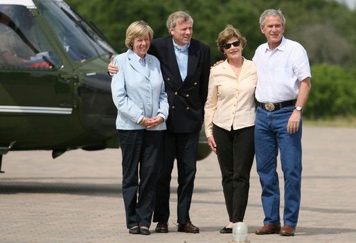 President George W. Bush and Mrs. Laura Bush stand with NATO Secretary-General Jaap de Hoop Scheffer and wife, Jeannine, Sunday, May 20, 2007, after their arrival in Crawford, Texas. White House photo by Shealah Craighead