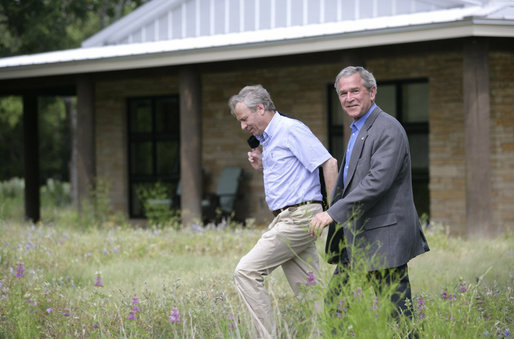 President George W. Bush and NATO Secretary-General Jaap de Hoop Scheffer walk the grounds of the Bush Ranch in Crawford, Texas Monday, May 21, 2007. During the two-day visit, the leaders discussed a variety of issues including Afghanistan and missile defense. White House photo by Shealah Craighead