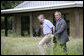 President George W. Bush and NATO Secretary-General Jaap de Hoop Scheffer walk the grounds of the Bush Ranch in Crawford, Texas Monday, May 21, 2007. During the two-day visit, the leaders discussed a variety of issues including Afghanistan and missile defense. White House photo by Shealah Craighead