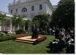 President George W. Bush responds to a reporter's question Thursday, May 24, 2007, during a morning press conference in the Rose Garden of the White House. White House photo by Joyce N. Boghosian