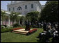 President George W. Bush responds to a reporter's question Thursday, May 24, 2007, during a morning press conference in the Rose Garden of the White House. White House photo by Joyce Boghosian