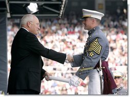 Vice President Dick Cheney presents a diploma to a U.S. Military Academy graduate during commencement ceremonies at Michie Stadium Saturday, May 26, 2007, in West Point, N.Y. White House photo by David Bohrer