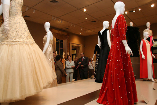 Mrs. Laura Bush looks at The Balenciaga exhibition at the Meadows Museum on Saturday, May 26, 2007, in Dallas. The exhibit features 70 original Balenciaga designs as well as 20 original creations by other designers, including Oscar de la Renta who designed the gown Mrs. Bush wore to the 2005 Inaugural Ball, and has loaned for the exhibition. White House photo by Shealah Craighead