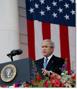 President George W. Bush addresses his remarks at the Memorial Day commemoration ceremony Monday, May 28, 2007, at Arlington National Cemetery in Arlington, Va. Addressing the gathered audience President Bush said, “The greatest memorial to our fallen troops cannot be found in the words we say or the places we gather. The more lasting tribute is all around us—a country where citizens have the right to worship as they want, to march for what they believe, and to say what they think.”  White House photo by Chris Greenberg