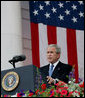 President George W. Bush addresses his remarks at the Memorial Day commemoration ceremony Monday, May 28, 2007, at Arlington National Cemetery in Arlington, Va. Addressing the gathered audience President Bush said, “The greatest memorial to our fallen troops cannot be found in the words we say or the places we gather. The more lasting tribute is all around us—a country where citizens have the right to worship as they want, to march for what they believe, and to say what they think.” White House photo by Chris Greenberg