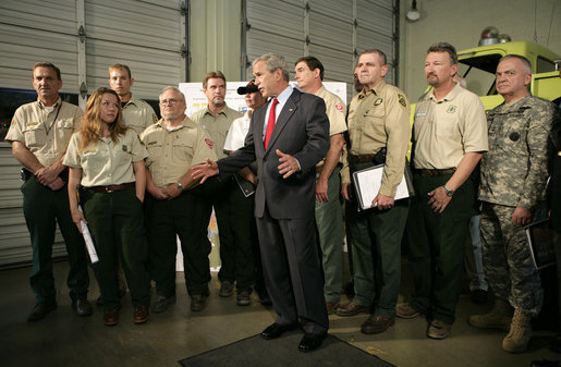 President George W. Bush delivers remarks after a briefing Tuesday, May 29, 2007 in Brunswick, Ga., on the Georgia and Florida wildfires. Said the President, "It's a very difficult period for the people, particularly in southeast Georgia and north Florida. A lot of lives are being affected. I've come down to let the people know that we are concerned about their livelihood and I'm fully aware of the nature of these fires, that we strongly support the efforts being done here to fight these fires, and we wish the people all the best." White House photo by Eric Draper