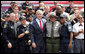 President George W. Bush poses with staff and students of the Federal Law Enforcement Training Center Tuesday, May 29, 2007, in Glynco, Ga. The President toured the facility and delivered remarks on immigration reform before returning to Washington, D.C. White House photo by Eric Draper