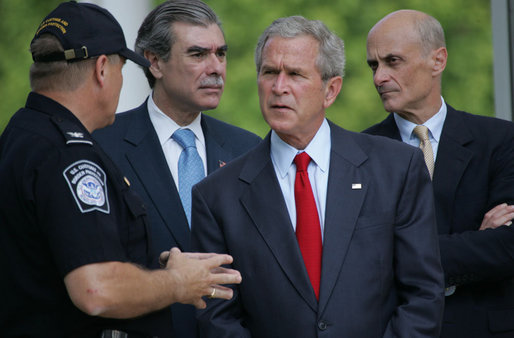President George W. Bush listens to Ed Cassidy, Assistant Director of U.S. Customs and Border Protection, during a tour Tuesday, May 29, 2007, of the Federal Law Enforcement Training Center in Glynco, Ga. Joining the President are Secretary Michael Chertoff of the Department of Homeland Security, and Secretary Carlos Gutierrez of the Department of Commerce. White House photo by Chris Greenberg