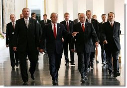 President George W. Bush walks with Czech Republic Prime Minister Mirek Topolanek, right, and President Vaclav Klaus Tuesday, June 5, 2007, during a visit to Prague Castle in Prague, Czech Republic. "It is fitting that we meet in the Czech Republic -- a nation at the heart of Europe, and of the struggle for freedom on this continent," said President Bush in his remarks. "Nine decades ago, Tomas Masaryk proclaimed Czechoslovakia's independence based on the 'ideals of modern democracy'." White House photo by Eric Draper