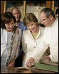 Mrs. Laura Bush and Mrs. Livia Klausova, First Lady of Czech Republic, look through a book during their visit to the Strahov Archives and Library Tuesday, June 5, 2007, in Prague, Czech Republic. More than 800 years old, it is home to a library, gallery of art and monastery. White House photo by Shealah Craighead
