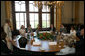 Mrs. Laura Bush listens to Sylvia Bretschneider, President of the State Parliament, during a roundtable discussion Wednesday, June 6, 2007, with Fulbright Scholars at the Schwerin Castle in Schwerin, Germany. Established in 1946, more than 279,000 scholars have participated in the program worldwide. White House photo by Shealah Craighead