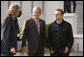 President George W. Bush shares a moment with Irish rocker Bono, Sir Bob Geldof, left, and Senegalese singer Youssou N'Dour Wednesday, June 6, 2007, the Kempinski Grand Hotel in Heiligendamm, Germany, site of the 2007 G8 Summit. White House photo by Shealah Craighead