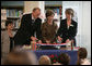 Mrs. Laura Bush participates in a ribbon-cutting Wednesday, June 6, 2007, at the Schwerin City Library in Schwerin, Germany. Joining her are Norbert Claussen, Lord Mayor of Schwerin, and Heidrun Hamann, the Director of the library. White House photo by Shealah Craighead