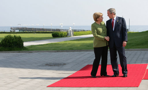 President George W. Bush is officially welcomed by Germany's Chancellor Angela Merkel to the G8 Summit Thursday, June 7, 2007, at the Kempinski Grand Hotel in Heiligendamm, Germany. White House photo by Eric Draper