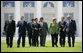 Leaders of the G8 walk across the grass en route to the official photograph Thursday, June 7, 2007, in Heiligendamm, Germany. From left are: Prime Minister Stephen Harper of Canada; Prime Minister Tony Blair of the United Kingdom; Jose Manuel Barroso, President of the European Commission; President Nicolas Sarkozy of France; President Vladimir Putin of Russia; Prime Minister Shinzo Abe of Japan; Chancellor Angela Merkel of Germany; Prime Minister Romano Prodi of Italy, and President George W. Bush. White House photo by Eric Draper