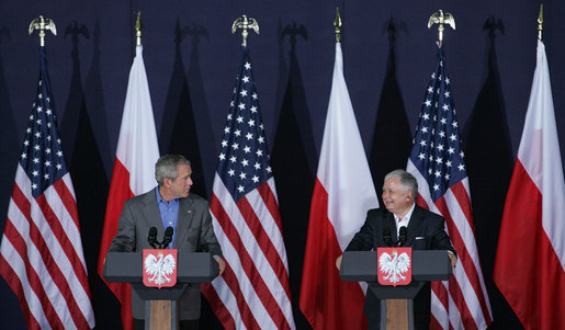 President George W. Bush draws a smile from Poland's President Lech Kaczynski during their joint statement Friday, June 8, 2007, in Gdansk. Said President Bush, "One thing I do want to do is praise this good country for being so strong for freedom. I love to be in a land where people value liberty, and are willing to help others realize the blessings of liberty." White House photo by Chris Greenberg