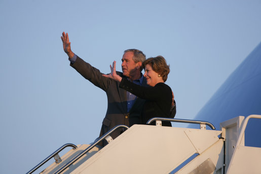 President George W. Bush and Mrs. Laura Bush wave as they board Air Force One for departure from Poland Friday, June 8, 2007, at Gdansk Lech Walesa International Airport in Gdansk. White House photo by Chris Greenberg