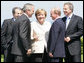 President George W. Bush shares a moment with President Vladimir Putin of Russia, and Chancellor Angela Merkel of Germany, after a photo opportunity with Outreach Representatives at the G8 Summit in Heiligendamm, Germany. With them are Prime Minister Romano Prodi, left, of Italy, and Prime Minister Tony Blair of the United Kingdom. White House photo by Eric Draper