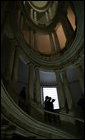 President George W. Bush and Mrs. Laura Bush are silhouetted as they descend a circular stairwell with Gen. Rolando Mosca Moschini, military advisor to President Giorgio Napolitano of Italy, during a visit to Quirinale Palace Saturday, June 9, 2007, in Rome. White House photo by Eric Draper