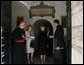 Mrs. Laura Bush shakes the hand of a Vatican official after visiting the tomb of Pope John Paul II Saturday, June 9, 2007, in Rome. White House photo by Shealah Craighead