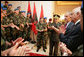 Albanian troops applaud President George W. Bush Sunday, June 10, 2007, after he greeted them at the Palace of Brigades in Tirana. The greeting came during the daylong visit that marked the first time a sitting U.S. president has been in the country. White House photo by Eric Draper