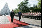 President George W. Bush and Bulgarian President Georgi Parvanov walk along a red carpet in Nevsky Square in Sofia, Bulgaria, Monday, June 11, 2007, during the official welcome for President Bush and Mrs. Laura Bush. White House photo by Eric Draper