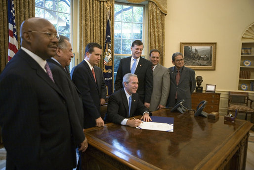 President George W. Bush signs H.R. 1676, the Native American Ownership Opportunity Act of 2007, in the Oval Office Monday, June 18, 2007. The act amends the Housing and Community Development Act of 1992 to extend the authorization of appropriations to the Indian Housing Loan Guarantee Fund for loan guarantees for Native American housing. White House photo by Debra Gulbas