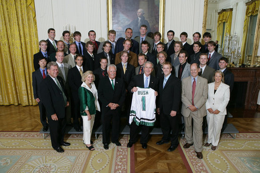 President George W. Bush stands with members of the Michigan State University Men's Ice Hockey 2007 Championship Team Monday, June 18, 2007 at the White House, during a photo opportunity with the 2006 and 2007 NCAA Sports Champions. White House photo by Eric Draper