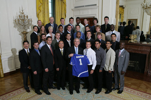 President George W. Bush stands with members of the University of California, Santa Barbara Men's Soccer 2006 Championship Team Monday, June 18, 2007 at the White House, during a photo opportunity with the 2006 and 2007 NCAA Sports Champions. White House photo by Eric Draper