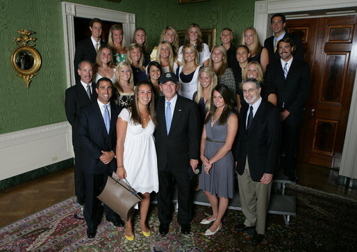 President George W. Bush stands with members of the University of California, Los Angeles Women's Water Polo 2007 Championship Team Monday, June 18, 2007 at the White House, during a photo opportunity with the 2006 and 2007 NCAA Sports Champions. White House photo by Eric Draper