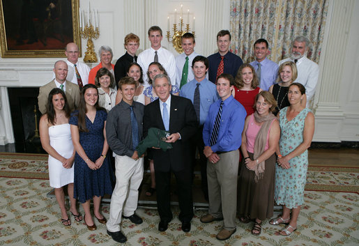 President George W. Bush stands with members of the Dartmouth College Men and Women's Ski 2007 Championship Team Monday, June 18, 2007 at the White House, during a photo opportunity with the 2006 and 2007 NCAA Sports Champions. White House photo by Eric Draper