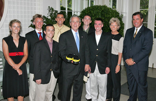 President George W. Bush stands with members of the University of Colorado Boulder Men's Cross Country 2006 Championship Team Monday, June 18, 2007 at the White House, during a photo opportunity with the 2006 and 2007 NCAA Sports Champions. White House photo by Joyce N. Boghosian