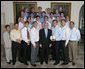 President George W. Bush stands with members of the University of California Berkeley Men's Water Polo 2006 Championship Team Monday, June 18, 2007 at the White House, during a photo opportunity with the 2006 and 2007 NCAA Sports Champions. White House photo by Joyce N. Boghosian