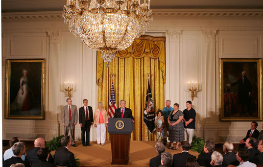 President George W. Bush, joined by families who were aided by the use of adult stem cells in their health treatments, addresses his remarks concerning his veto of S.5, the “Stem Cell Research Enhancement Act of 2007,” in the East Room of the White House Wednesday, June 20, 2007. White House photo by Joyce N. Boghosian