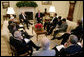 President George W. Bush speaks with Republican members of the House of Representatives in an Oval Office meeting Wednesday, June 20, 2007. White House photo by Eric Draper