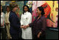 Mrs. Laura Bush is greeted by Dr. Orlando Albuquerque, Director of Pediatric Services, at Maputo Central Pediatric Day Hospital Wednesday, June 27, 2007, in Maputo, Mozambique. The Pediatric Day Hospital was opened in 2004 with assistance from the French government and UNICEF, and is supported in part through the President's Emergency Plan for AIDS Relief. White House photo by Shealah Craighead