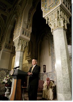President George W. Bush addresses his remarks at the 50th anniversary rededication ceremony of the Islamic Center of Washington Wednesday, June 27, 2007, where President Bush announced that he will appoint a Special Envoy to the Organization of the Islamic Conference. Dr. Abdullah Khouj, director of the the Islamic Center, is seen listening in background. White House photo by Eric Draper