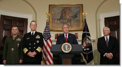 President George W. Bush stands stands with Marine General James Cartwright, left, Navy Admiral Michael Mullen, and Secretary of Defense Robert Gates, right, as he announces his nomination of Admiral Mullen as Chairman and Gen. Cartwright as Vice Chairman of the Joint Chiefs of Staff Thursday, June 28, 2007, in the Roosevelt Room of the White House.  White House photo by Chris Greenberg