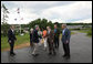 Russian President Vladimir Putin is welcomed by President George W. Bush and the United States Delegation after arriving at Walker's Point in Kennebunkport, Maine, Sunday, July 1, 2007. White House photo by Eric Draper